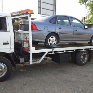 Truck is towing a car